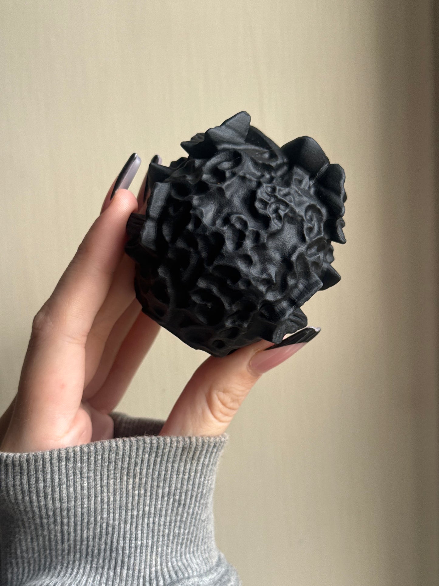 Black obsidian butterfly skull carving