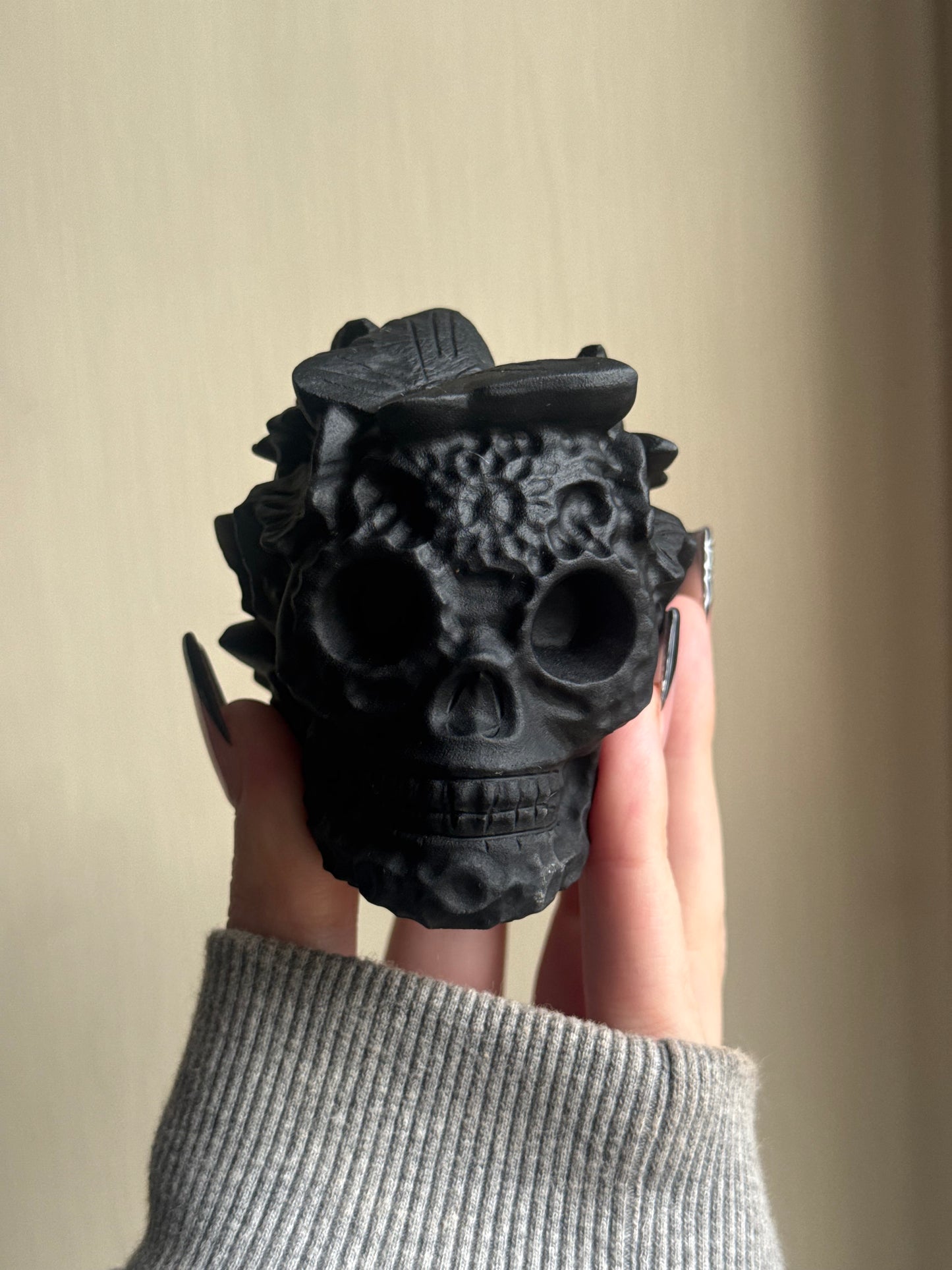 Black obsidian butterfly skull carving