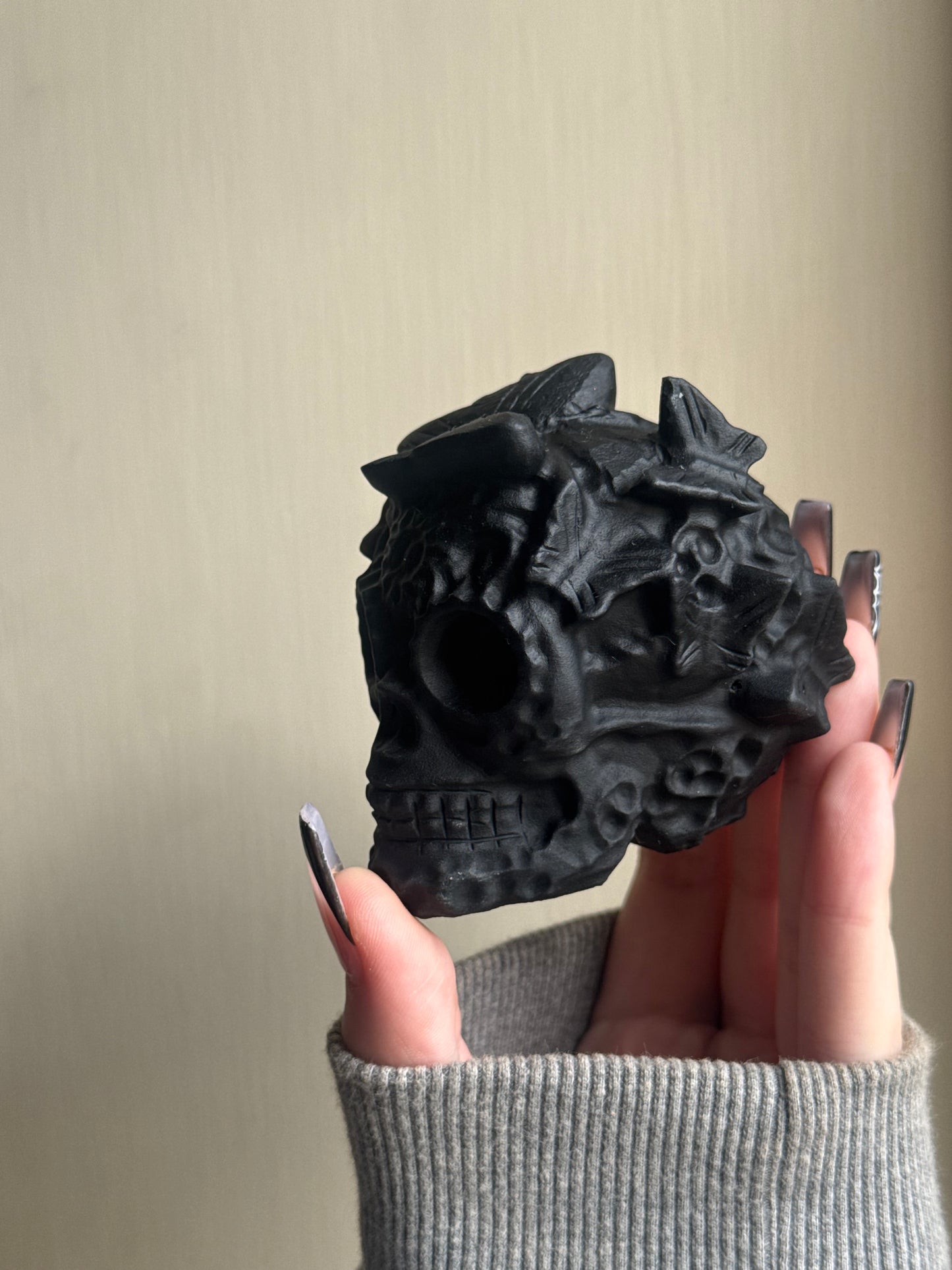 Black obsidian butterfly skull carving