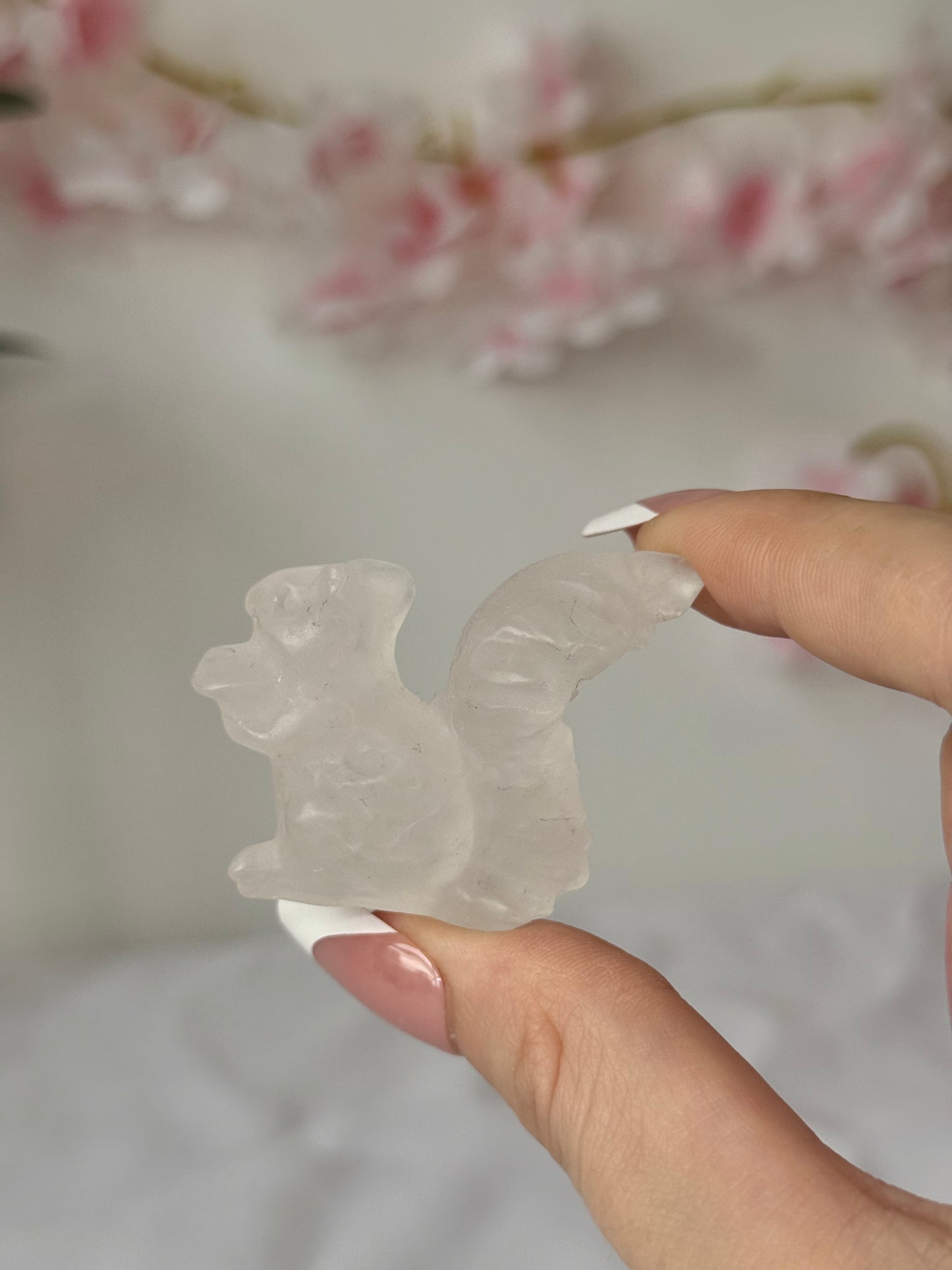 Clear quartz squirrel carving