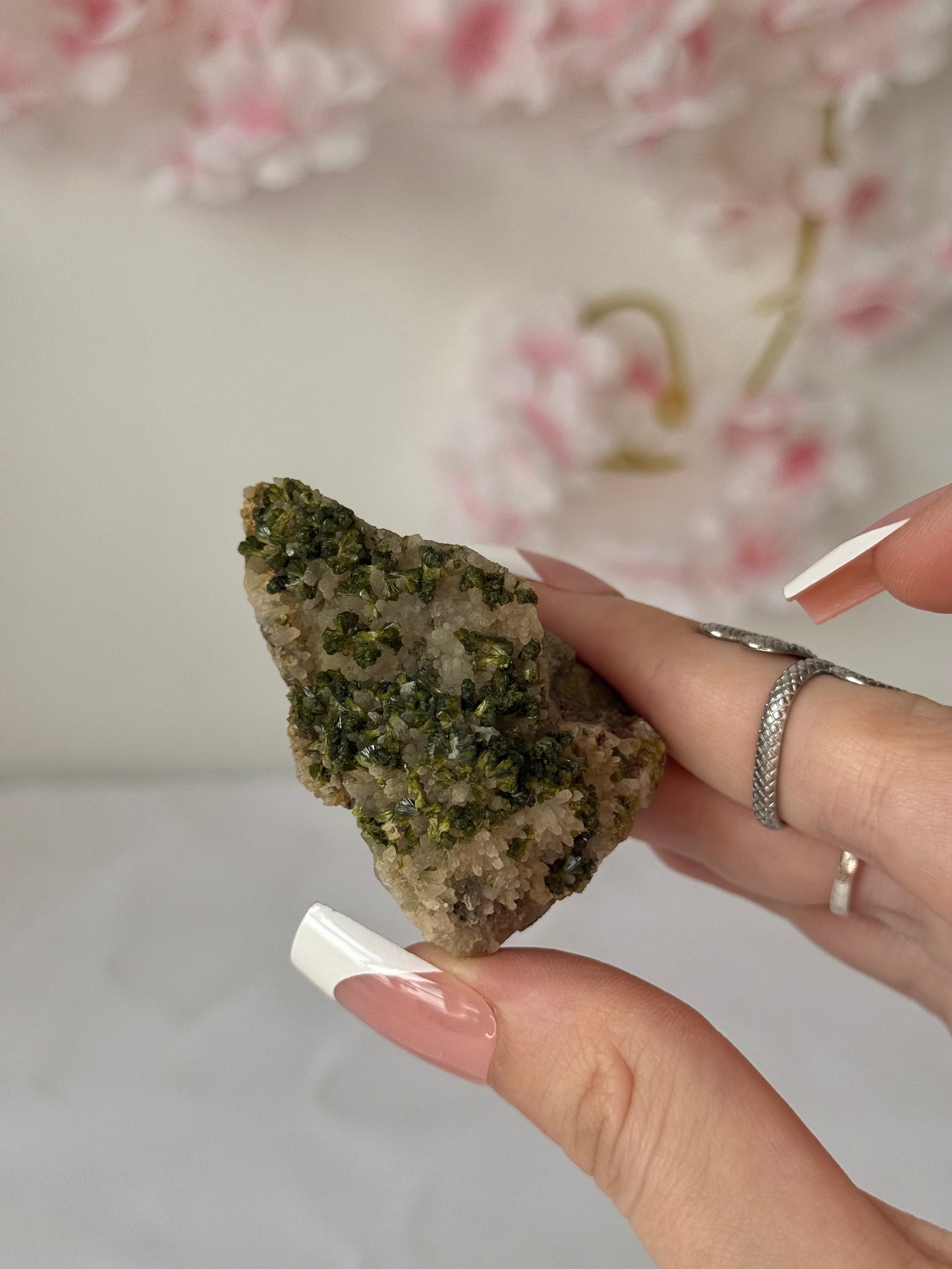 Epidote on quartz specimen (b)